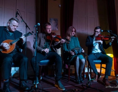 Actor Brendan Gleeson plays the mandolin with fiddle player and filmmaker Ciarán Ó Maonaigh, concertina player/dancer Caitlín Nic Gabhann, and fiddle player and Director of the Irish Traditional Music Archive Liam O’Connor at the event ‘An Evening with Brendan O’Connor’ incollaboration with Business to Arts. Photo: Des Gallagher